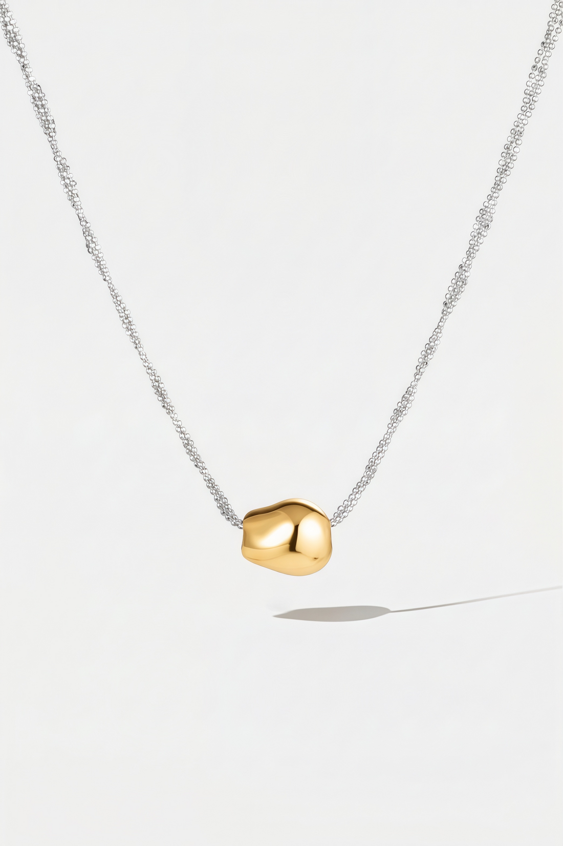 Polished Sculptural Pendant Necklace – Pebble